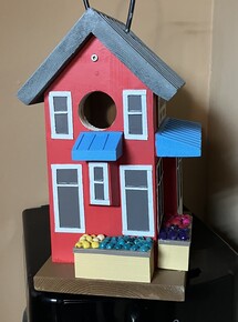 Ken Knutson Birdhouse won by Connie Bremner
